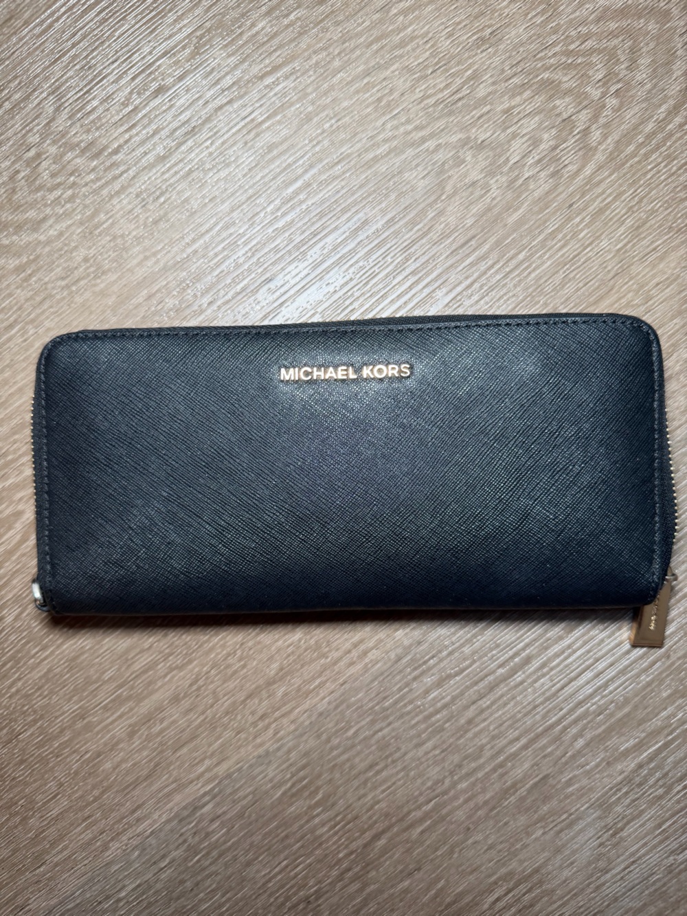 Michael Kors Black Zip-Around Saffiano Wallet with Gold Logo